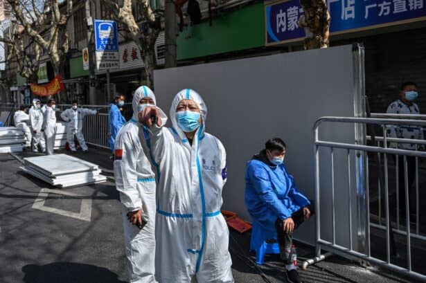 Shanghai Residents Clash With Police Over Quarantine Centers Under Construction