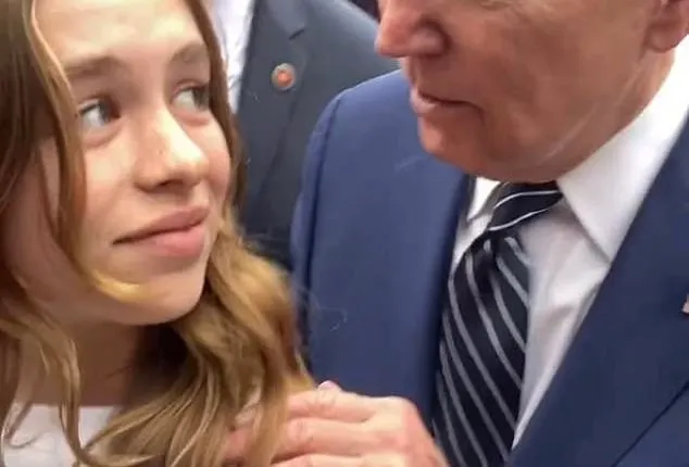 Rantingly Creepy Joe Biden leans in grabs teen girls shoulder to
