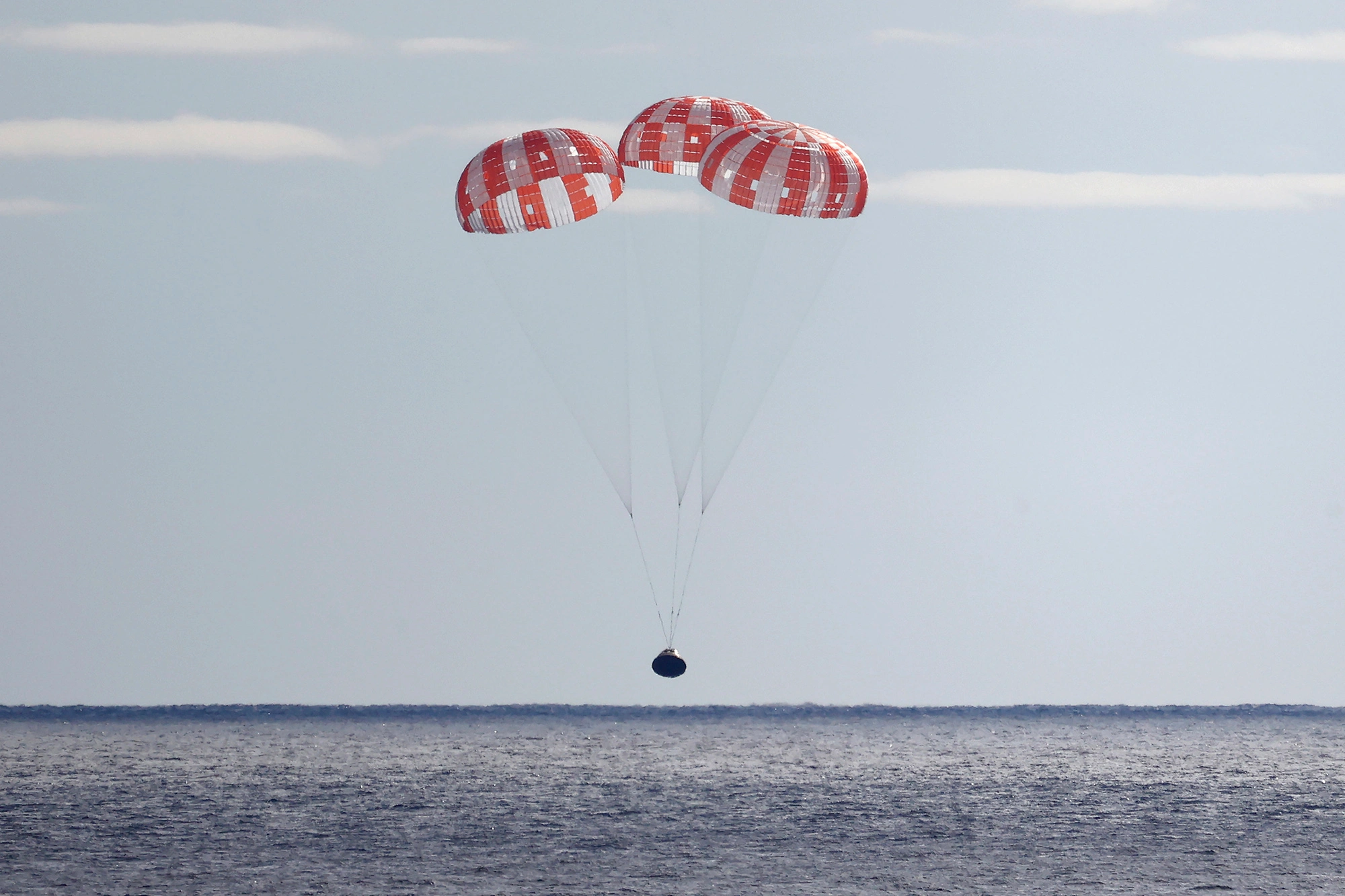 NASA’s Orion Capsule Splashes Down In Pacific, Completing Artemis I Mission
