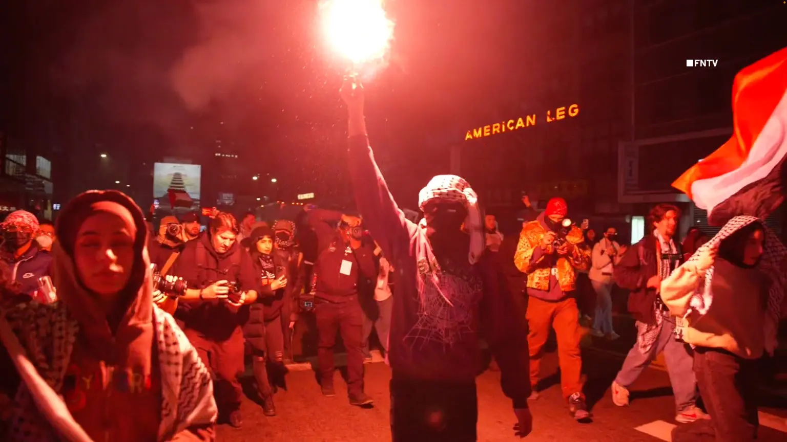 Anti-Israel Protesters Carry Flares To March On NYPD HQ