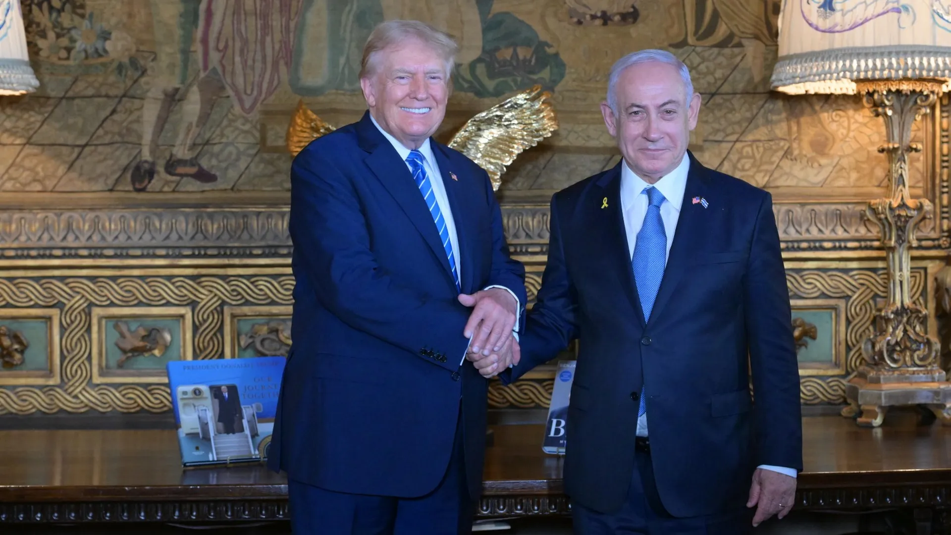 Trump Warmly Greets Netanyahu, Wife At Mar-a-Lago