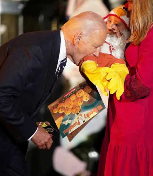 Biden Bites Baby Dressed As Chicken During WH Halloween Event