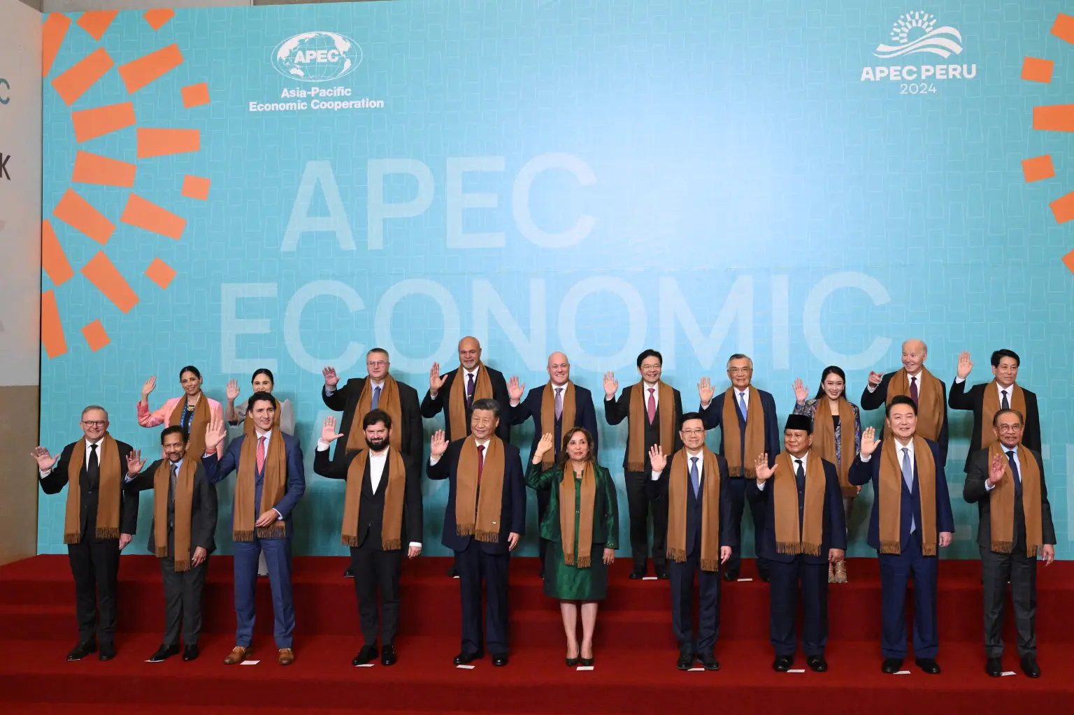 Lame-duck Biden Humiliated With Back-Corner Spot In APEC Family Photo