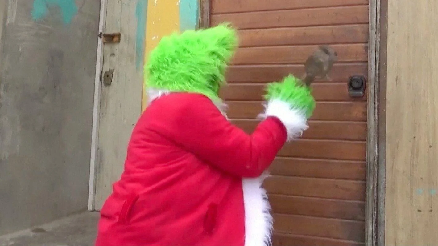 Officer Dressed As The Grinch Makes Drug Bust In Peru