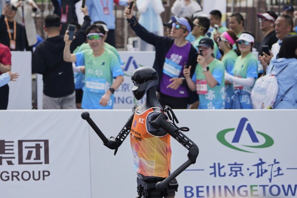Stumbling And Overheating, Most Humanoid Robots Fail To Finish Half-Marathon In Beijing